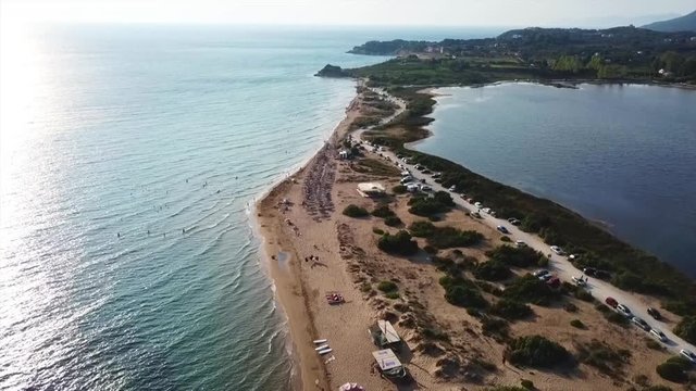 Aerial drone video of iconic lake of Korission a natural preserve and beach of Halikounas, Corfu island, Ionian, Greece
