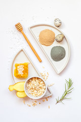 Minimalistic set of ingredients for making homemade organic natural cosmetics. Top view, flat