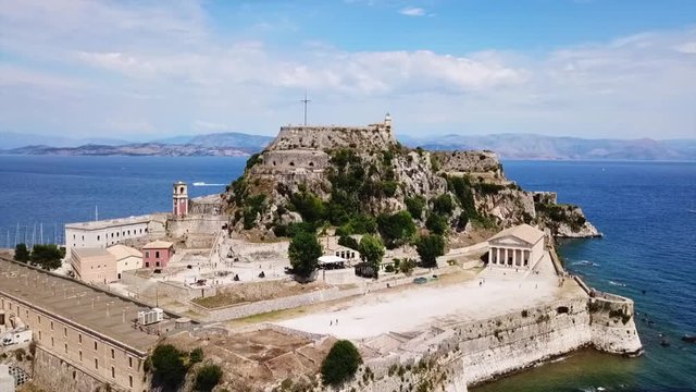 Aerial drone video of iconic old Venetian sea fortress of Corfu near center of old town, Kerkyra island, Greece