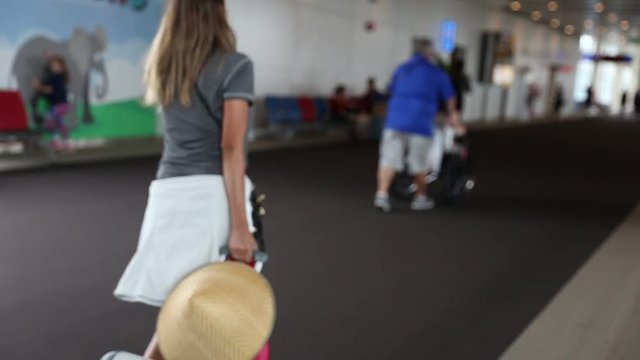 Passengers are going to gates in Bali airport.