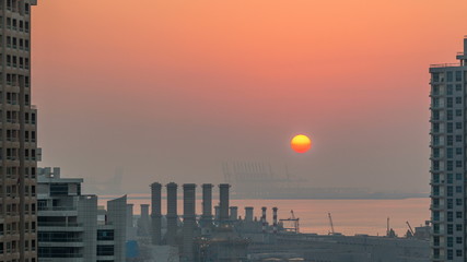 Fototapeta na wymiar Aerial view of Dubai Marina from a vantage point at sunset timelapse.