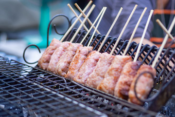 Close-up of Thai sausages on street market