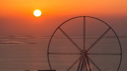 Bluewaters island at sunset aerial timelapse with ferris wheel