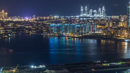 Obraz premium Aerial view of Palm Jumeirah Island night timelapse.