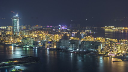Fototapeta na wymiar Aerial view of Palm Jumeirah Island night timelapse.