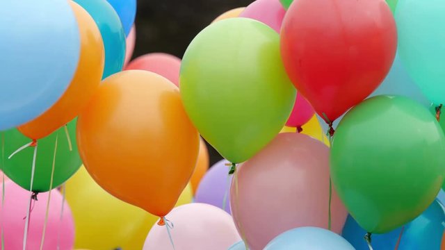 Lot of colorful balloons in the air.