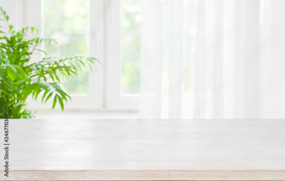 Canvas Prints wooden table top on blurred background of half curtained window
