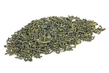 Heap of dry green tea on a white background