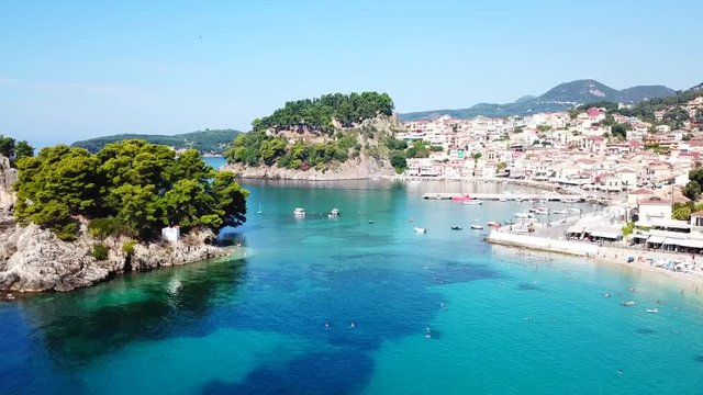 Aerial drone bird's eye view video of iconic and picturesque small fishing village of Parga, Epirus, Ionian, Greece