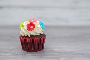 Delicious cupcakes with berries