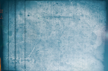 Blank grained and scratched film strip texture background