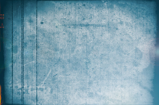 Blank grained and scratched film strip texture background