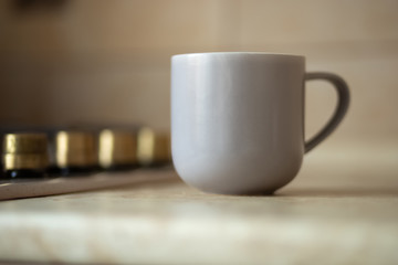 Gray mug on kitchen work surface