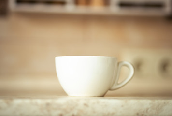 White mug on kitchen work surface