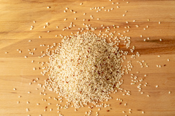Raw Brown Rice On A wooden table. Organic Brown Rice On A table.