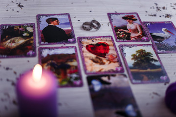 divination cards alignment for love and family with lavender and candle