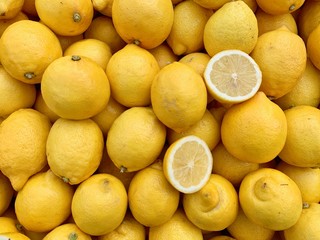 Set of whole lemons and items in a market stall