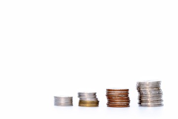 Coin stacks on white background.Saving, Investment money concept.Coin stack growing business and future.