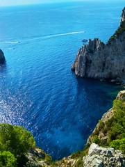 Faraglioni cliffs on the island of Capri in the Mediterranean sea