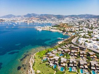 Fototapeta na wymiar Aerial view of sunny Bodrum with resorts and beachfront villas
