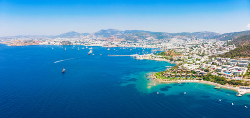 Panoramic aerial view of sunny Bodrum with resorts and beachfront villas - obrazy, fototapety, plakaty
