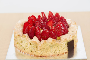 Close up of strawberry cake for sale.