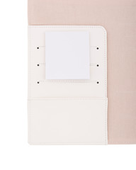 pocket in an open white notepad with beige lining