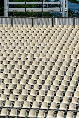 Fototapeta premium empty white seats with a boy sitting waiting