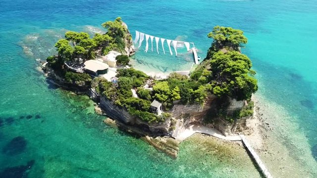 Aerial drone view video of famous islet of Cameo in Agios Sostis area of Laganas, Zakynthos island, Ionian Greece
