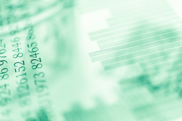 Double exposure Stock market display or forex trading graph and candlestick chart on dollar banknote