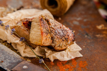 Raw fresh lamb meat and cleaver on dark background