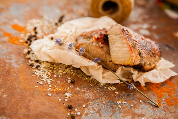 Raw fresh lamb meat and cleaver on dark background