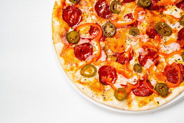Pepperoni Pizza with Mozzarella cheese, salami, Tomatoes, pepper.