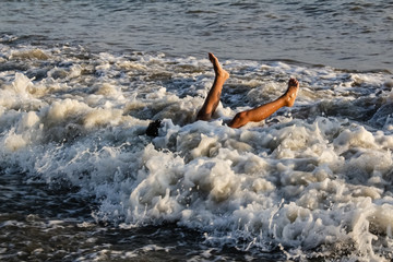 boy leg swimsuit by sea waves