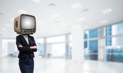 Business woman with old TV instead of head.