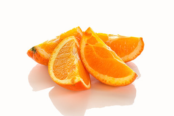 Oranges peeled in spiral shape isolated on white background