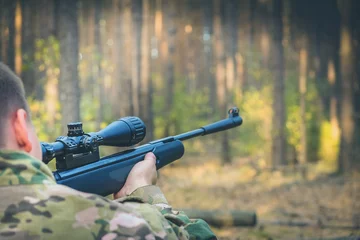 Foto op Canvas hunting with an airgun © evgenius1985