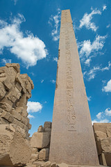 Obelisk with hieroglyphics and ancient egyptian Karnak Temple