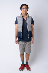 Full body shot of Japanese man ready for hiking