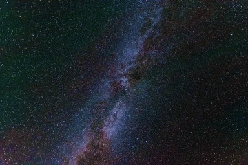 Bright night starry sky with millions of stars and galaxy Milky Way.