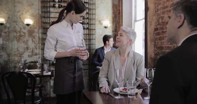 Waitress taking orders in a restaurant