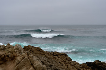 Seascape along the 17 Mile Drive in overcast day. California, USA