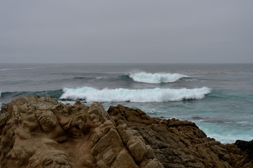 Seascape along the 17 Mile Drive in overcast day. California, USA