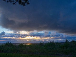 arctic summer night sea landscape with clouds