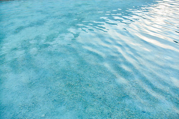 Natural travertine pools and terraces in Pamukkale in Turkey. Calcium deposits on travertine turquoise terraces at Turkey. Attractions resort town.