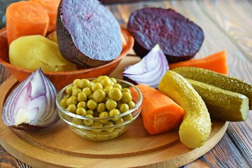 The ingredients for salad on a wooden Board.Vegetarian food.