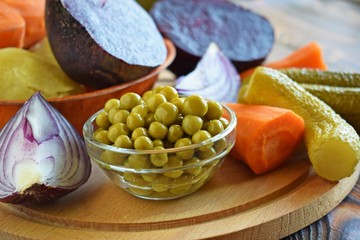 The ingredients for salad on a wooden Board.Vegetarian food.