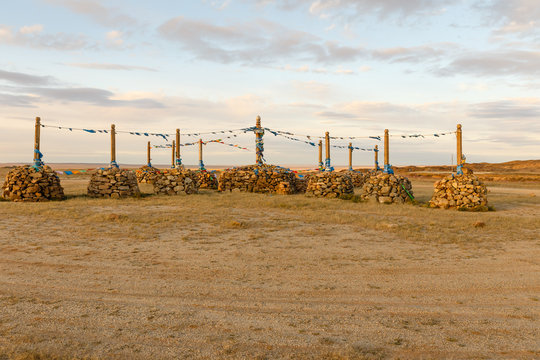 Mongolian Ovoo, Ceremonial Rock Pile on Mountain Top in Desert Steppes