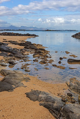 Seaside landscape with volcanic rocks on the seacoast on the tropical paradise island Mauritius