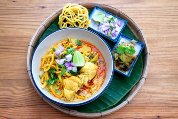 Egg Noodle in Chicken Curry, Thai Stly Food on banana leaf.(Kao Soi Kai )